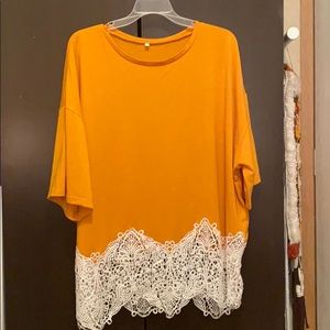 Mustard, lace hem top.